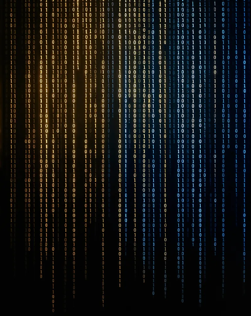 A wall of cascading binary code, streams of glowing ones and zeros raining down a black void, shifting from warm brass-gold on the left to cool steel-blue on the right.
